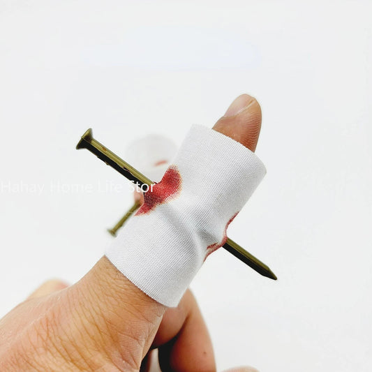 Fake Nail Through Finger